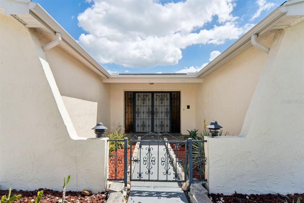 6955 Bottle Brush Drive Port Richey, FL 34668 - Photo 3 of 61