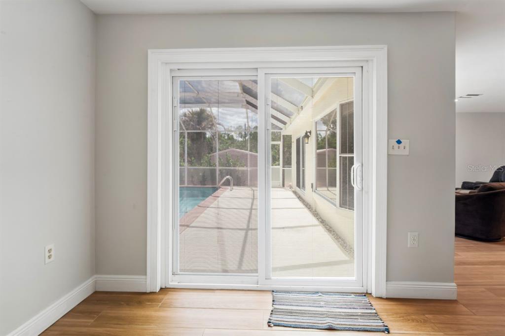 6955 Bottle Brush Drive Port Richey, FL 34668 - Photo 34 of 61 a view of front door of house