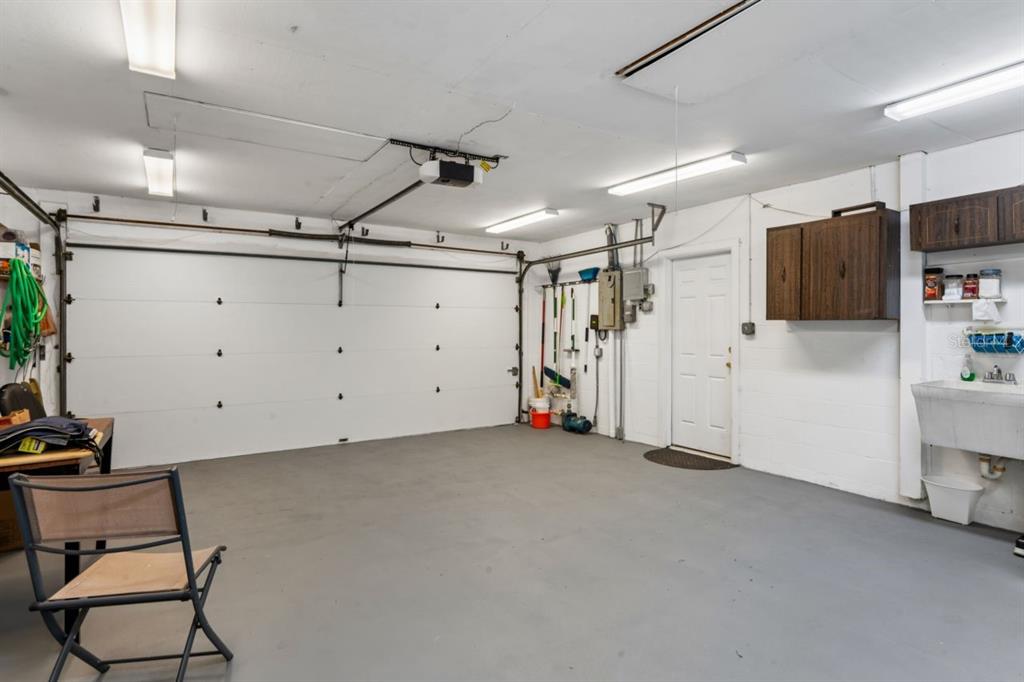 6955 Bottle Brush Drive Port Richey, FL 34668 - Photo 53 of 61 a view of a garage room