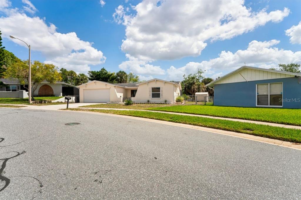 6955 Bottle Brush Drive Port Richey, FL 34668 - Photo 55 of 61 a view of swimming pool is middle in front of house