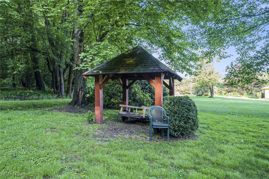 6315 Madison Road Thompson, OH 44086 - Photo 28 of 35 View of grassy yard with a gazebo