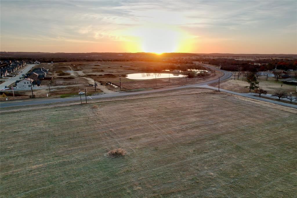 3207 Harris Street Gainesville, TX 76240 - Photo 3 of 13 an aerial view of residential building and ocean view in back