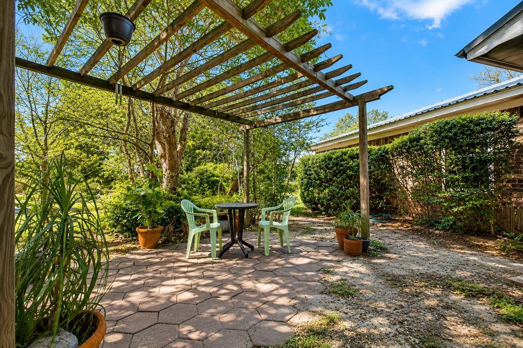 1706 Hitching Post Road Granbury, TX 76049 - Photo 3 of 40 Pergola at the front of home *Photo has been digitally enhanced