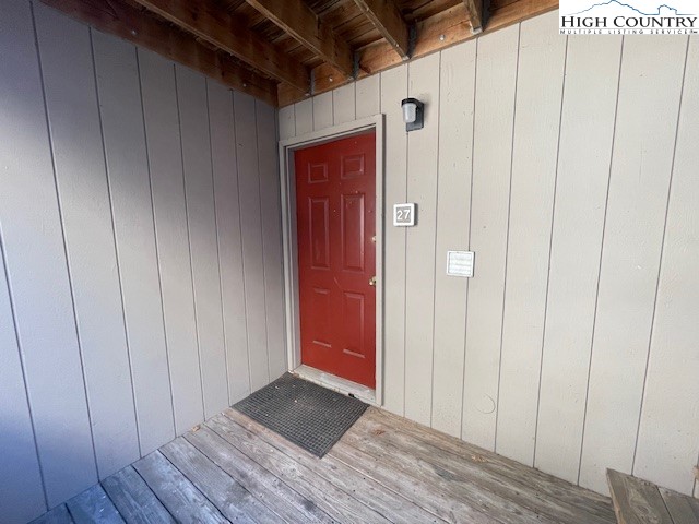 229 East King Street, Unit 27 Boone, NC 28607 - Photo 2 of 13 a view of hallway with wooden floor
