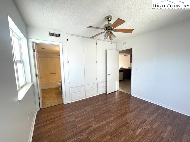 229 East King Street, Unit 27 Boone, NC 28607 - Photo 5 of 13 a view of an empty room and window
