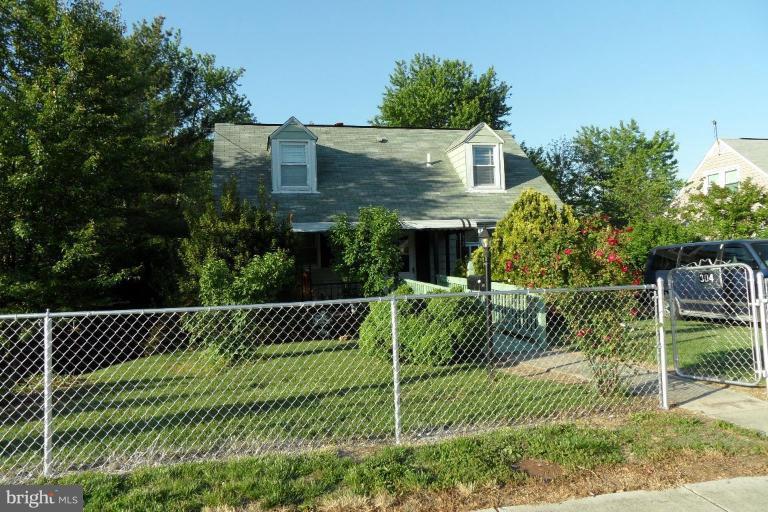 304 Charles Road Linthicum, MD 21090 - Photo 1 of 11 a front view of a house with a garden