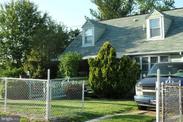 304 Charles Road Linthicum, MD 21090 - Photo 3 of 11 a view of a house with a yard