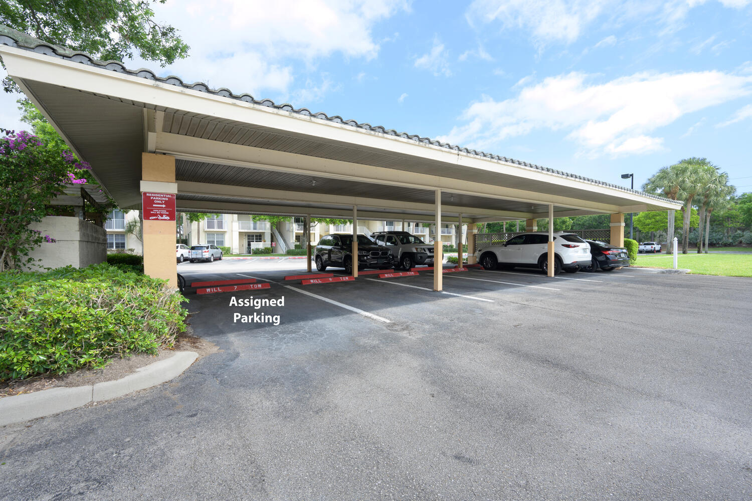 1116 University Boulevard, Unit 20 Jupiter, FL 33458 - Photo 17 of 22 Carport