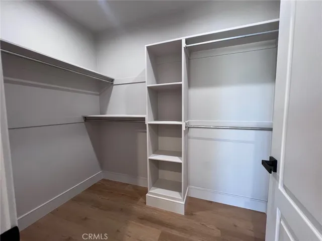 a view of an empty walk in closet