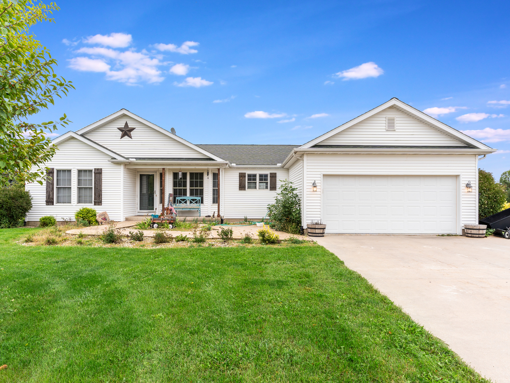 3964 East 2259th Road Serena, IL 60549 - Photo 1 of 36 a front view of a house with swimming pool yard and patio