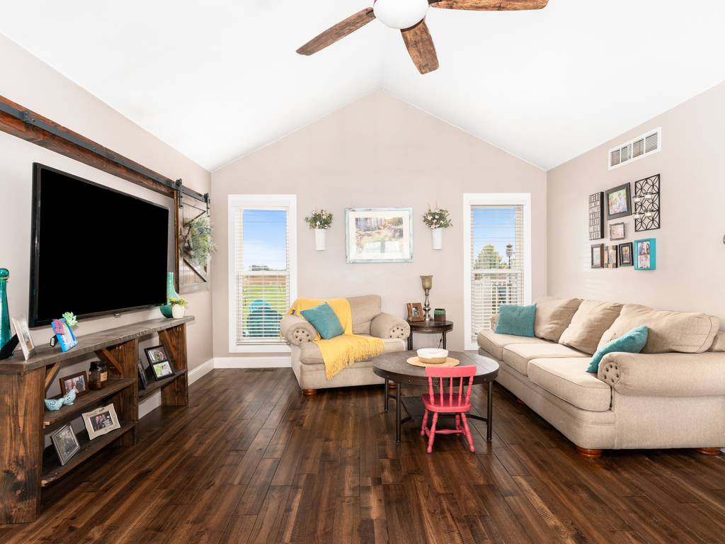 3964 East 2259th Road Serena, IL 60549 - Photo 11 of 36 a living room with furniture and a flat screen tv