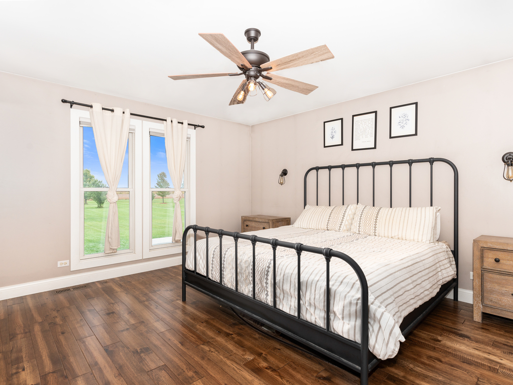 3964 East 2259th Road Serena, IL 60549 - Photo 17 of 36 a bedroom with a bed and a large window