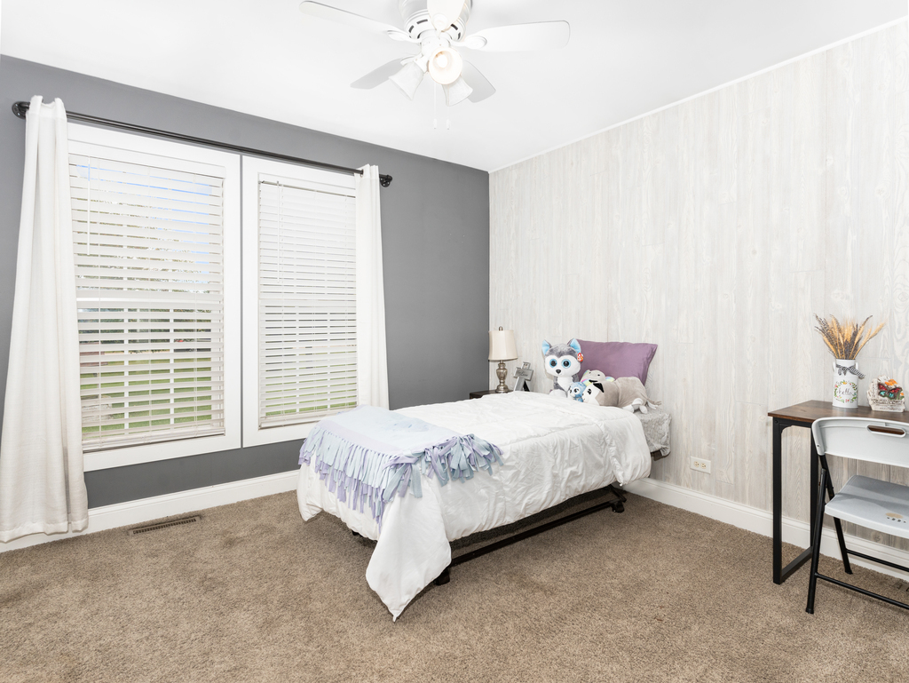 3964 East 2259th Road Serena, IL 60549 - Photo 19 of 36 a bedroom with a bed and a table