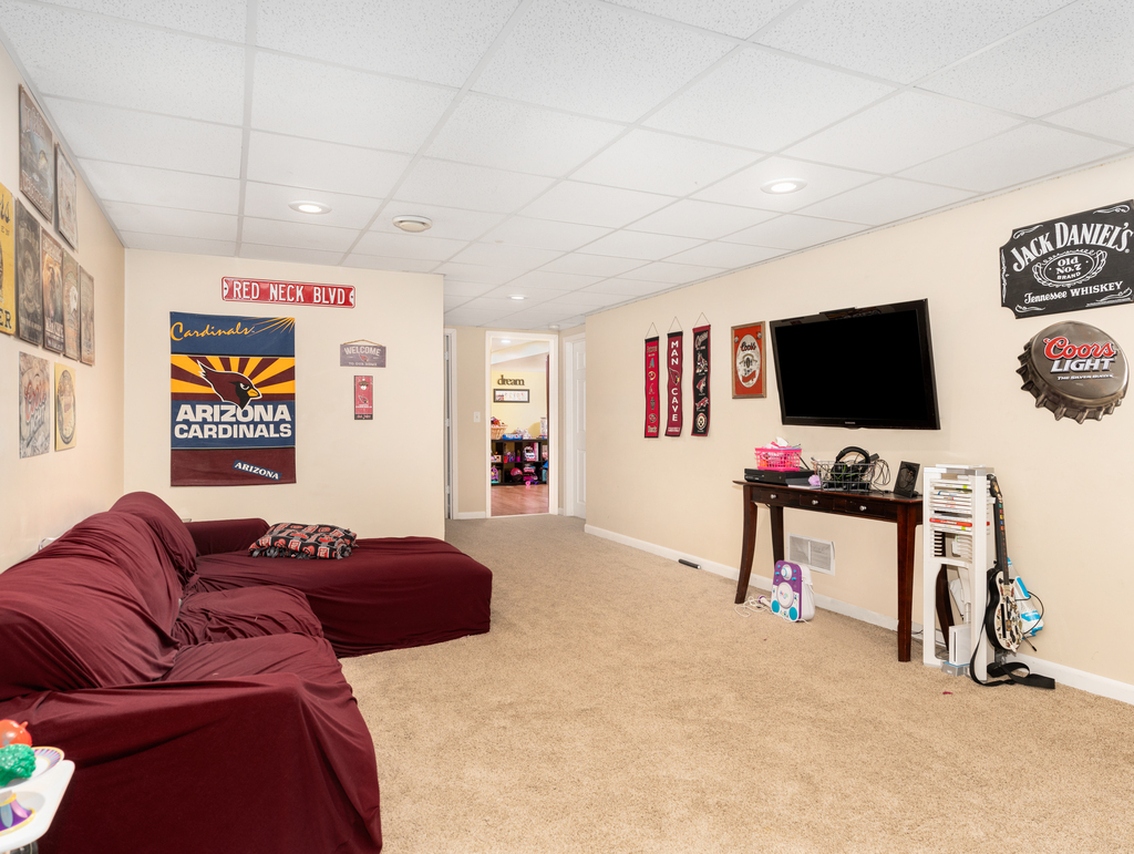 3964 East 2259th Road Serena, IL 60549 - Photo 24 of 36 a living room with furniture and a flat screen tv