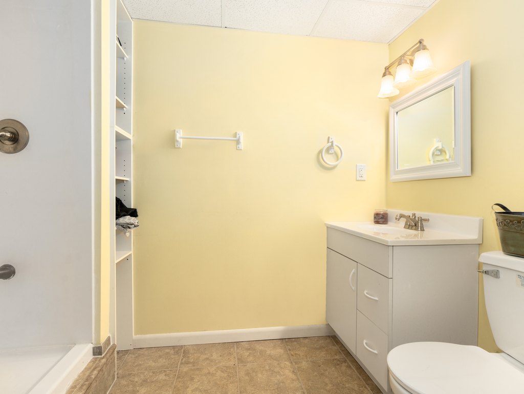 3964 East 2259th Road Serena, IL 60549 - Photo 28 of 36 a bathroom with a granite countertop toilet sink and mirror