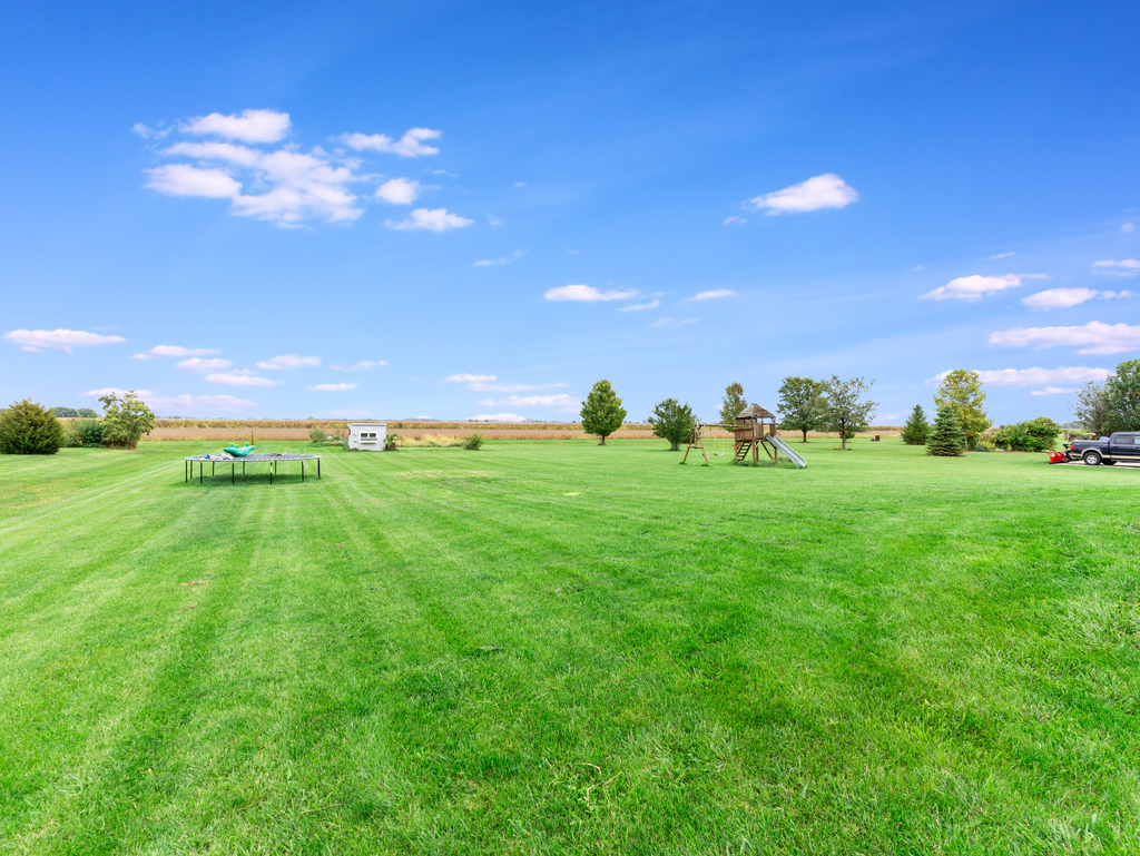 3964 East 2259th Road Serena, IL 60549 - Photo 35 of 36 a backyard of a house with lots of green space