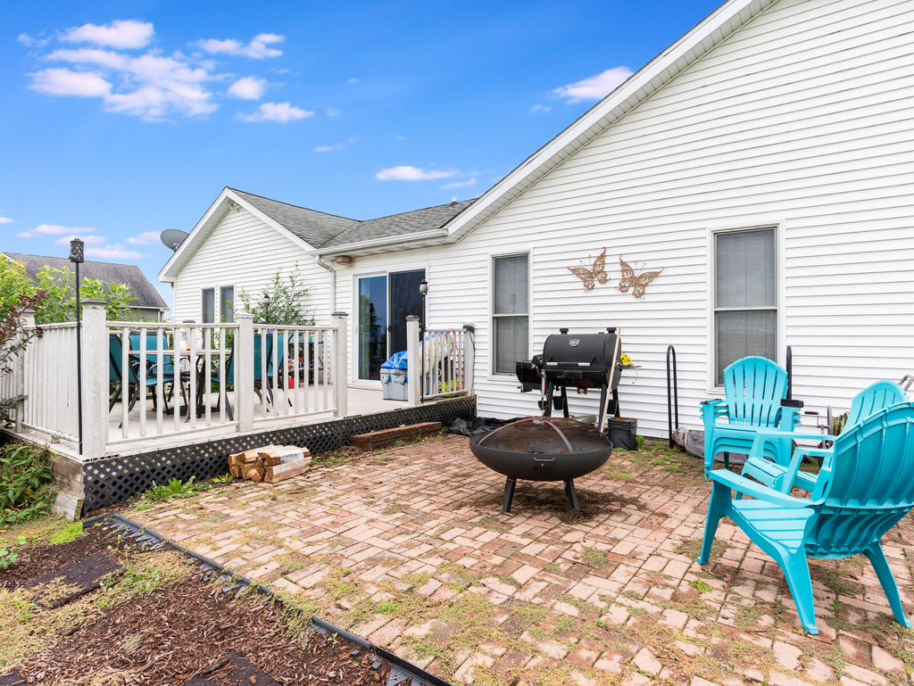 3964 East 2259th Road Serena, IL 60549 - Photo 5 of 36 a backyard of a house with table and chairs