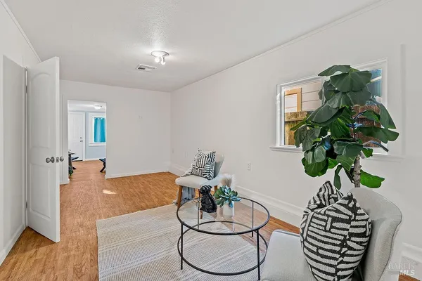 a bathroom with a shower curtain and a tub