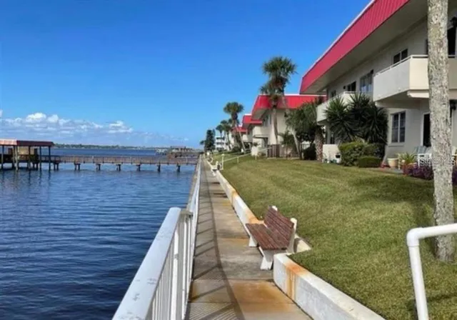 a view of a lake with a house