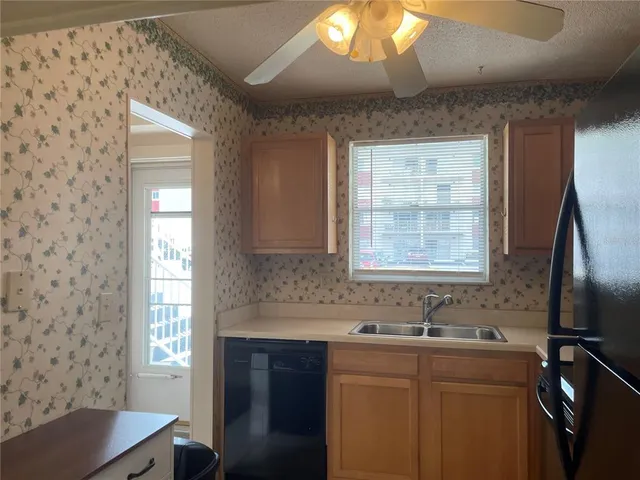 a bathroom with a sink a vanity and a mirror