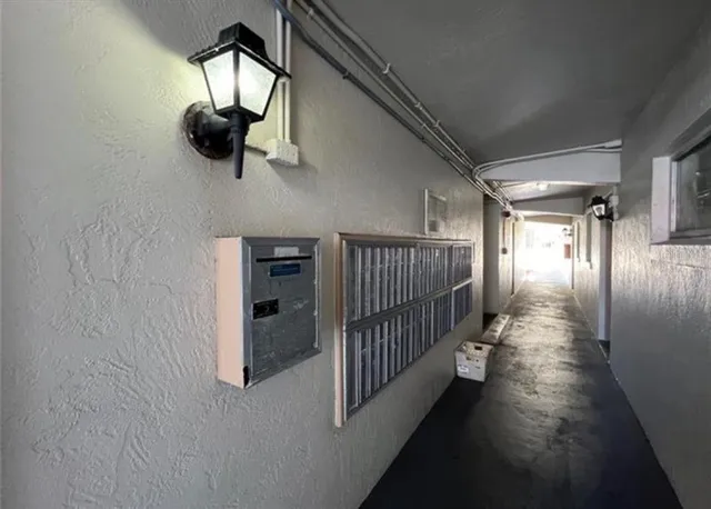 a view of an house with backyard and a garden
