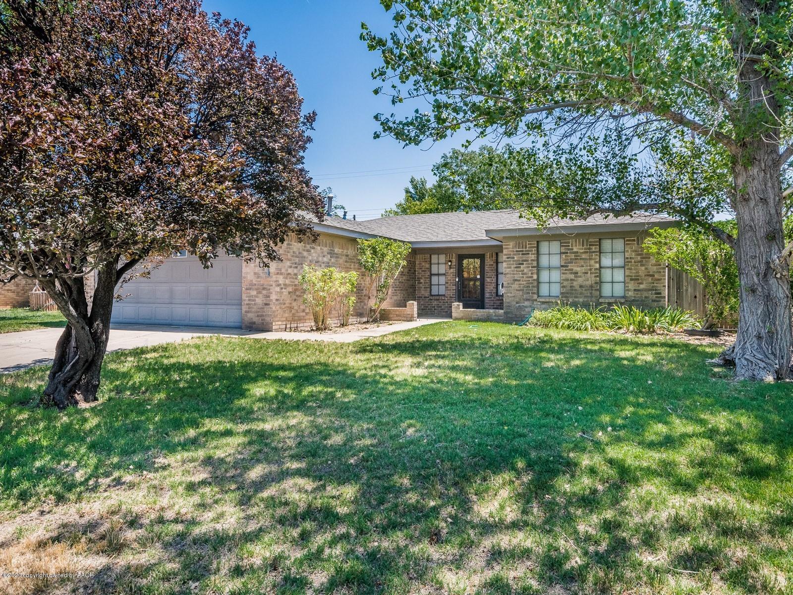 5301 South Milam Street Amarillo, TX 79110 - Photo 1 of 21 a view of house with backyard