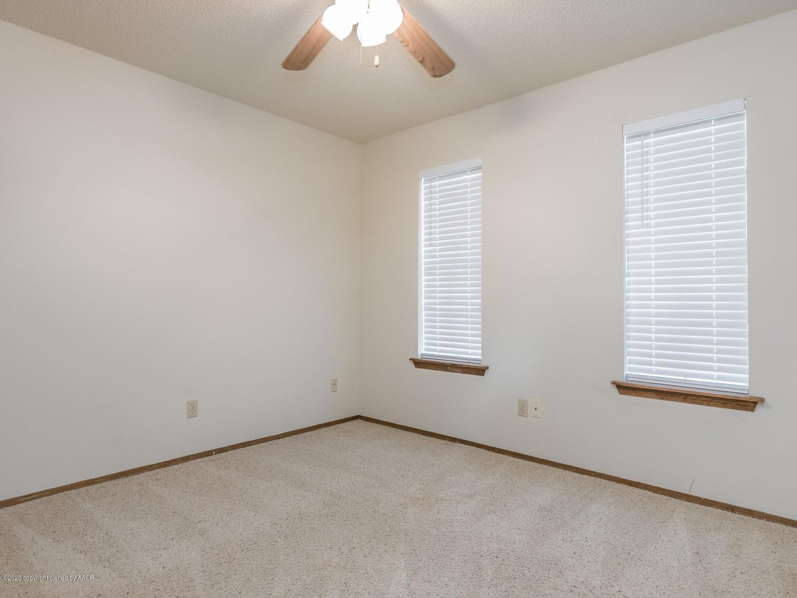 5301 South Milam Street Amarillo, TX 79110 - Photo 17 of 21 an empty room with a window