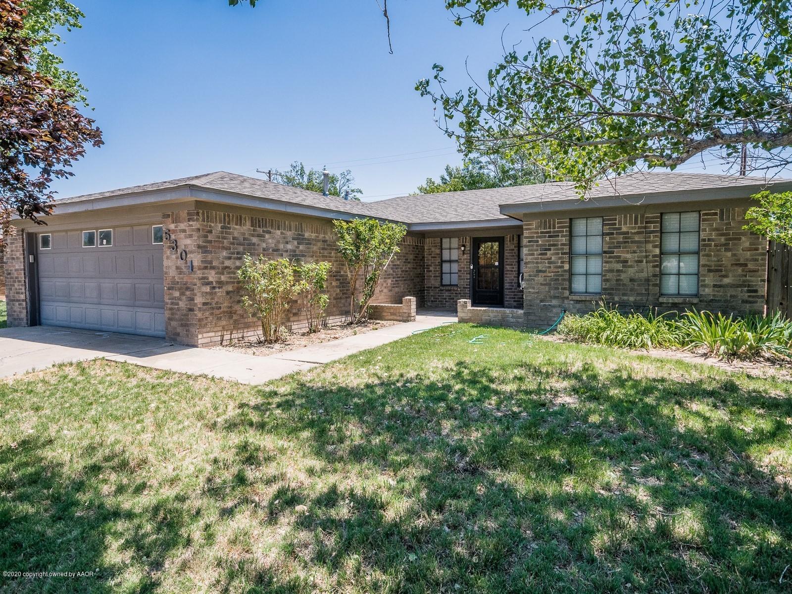 5301 South Milam Street Amarillo, TX 79110 - Photo 21 of 21 a view of a house with a yard