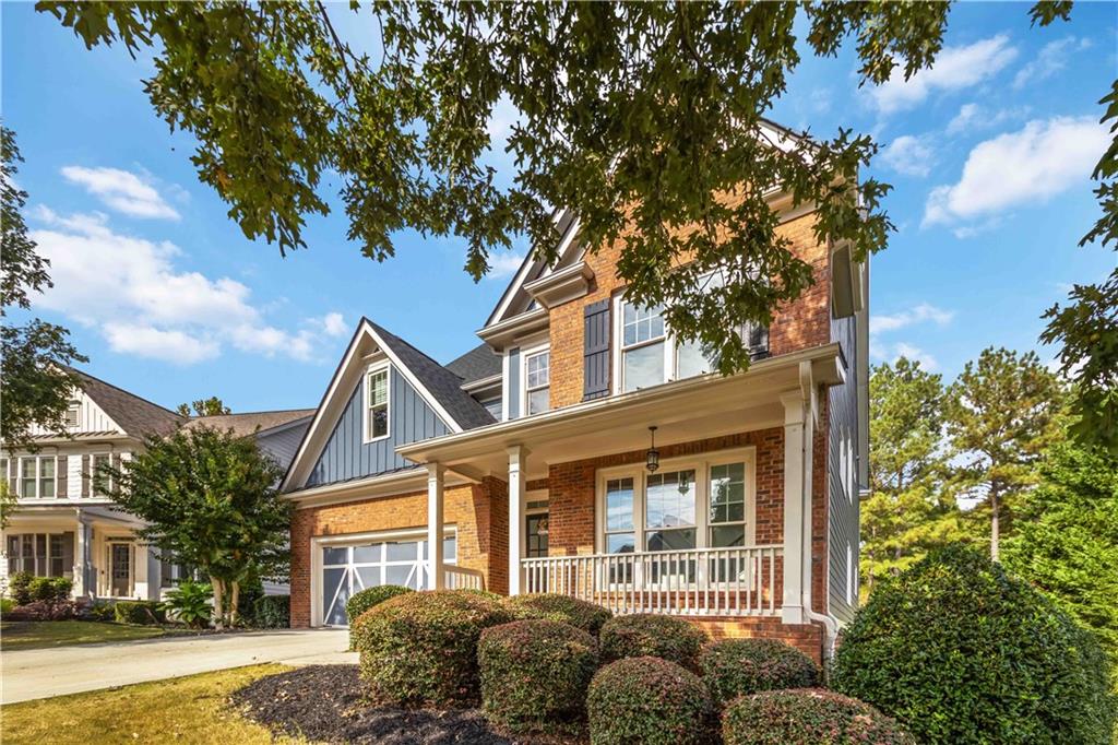 3320 Spencer Street Cumming, GA 30041 - Photo 2 of 70 front view of a house with a tree