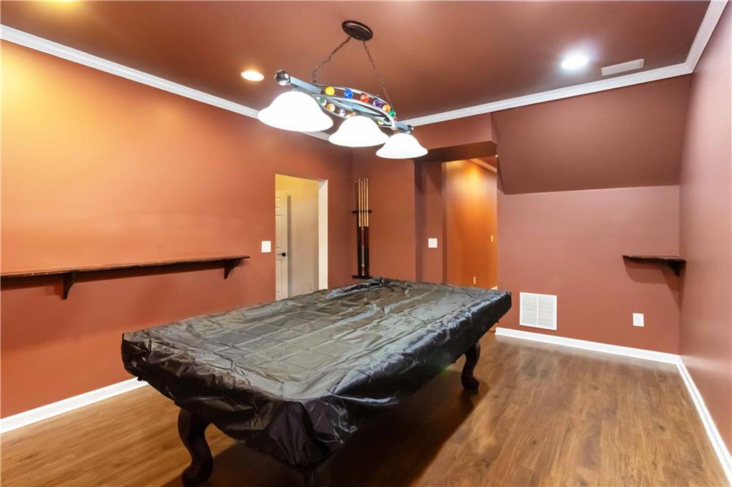 3320 Spencer Street Cumming, GA 30041 - Photo 43 of 70 a dinning room with a table and chairs