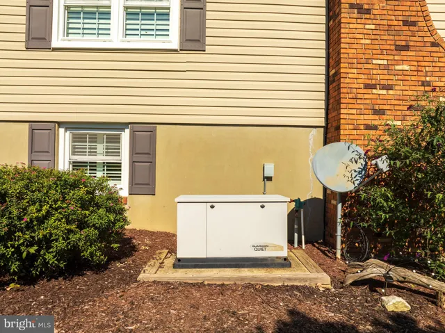 a kitchen with stainless steel appliances granite countertop a stove a sink and a wooden floors