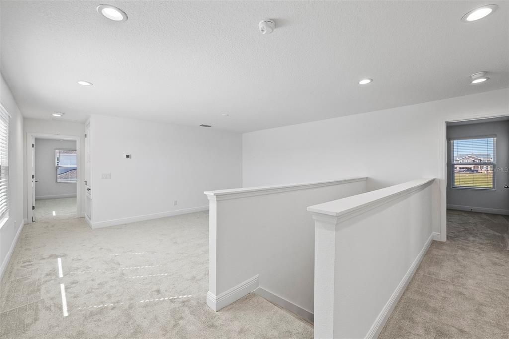 7247 Rolling Leaf Road Groveland, FL 34736 - Photo 7 of 19 2nd Floor Bonus Room