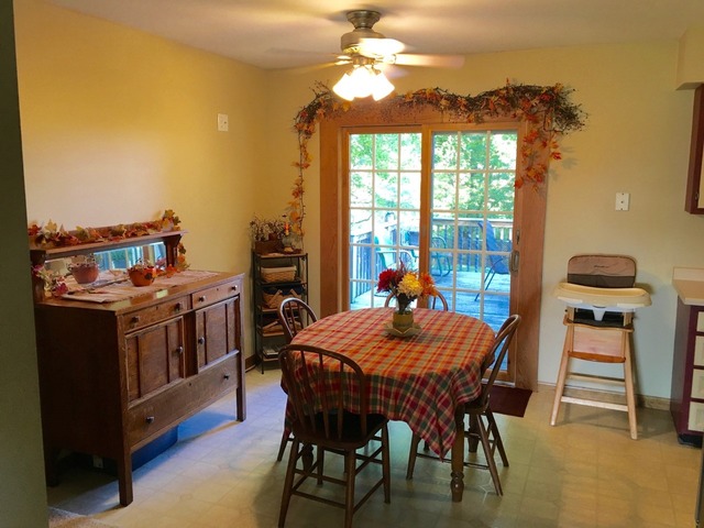 25064 Prophet Road Rock Falls, IL 61071 - Photo 3 of 22 a view of a dining room with furniture window and wooden floor