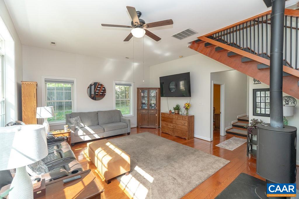 2851 Martin Kings Road Scottsville, VA 24590 - Photo 24 of 67 a living room with furniture and a wooden floor