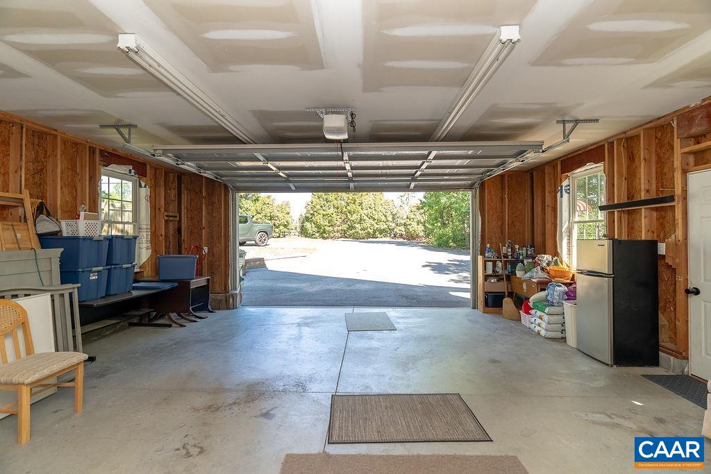 2851 Martin Kings Road Scottsville, VA 24590 - Photo 37 of 67 a room with lots of furniture and a large window