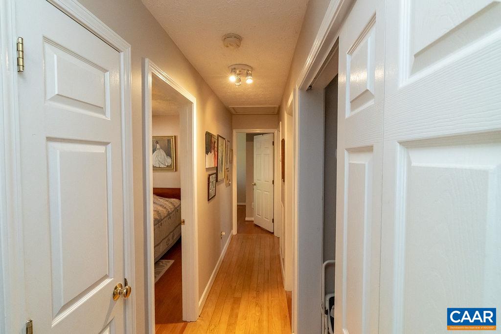 2851 Martin Kings Road Scottsville, VA 24590 - Photo 6 of 67 a view of hallway with wooden floor