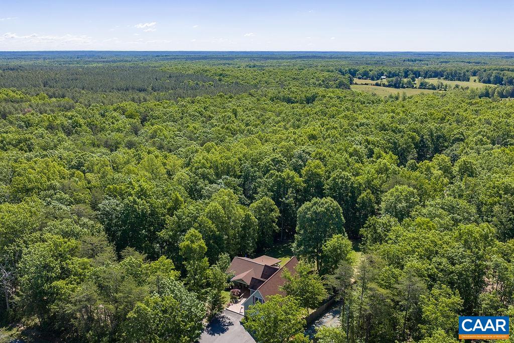 2851 Martin Kings Road Scottsville, VA 24590 - Photo 66 of 67 an aerial view of a houses with a yard and lake view