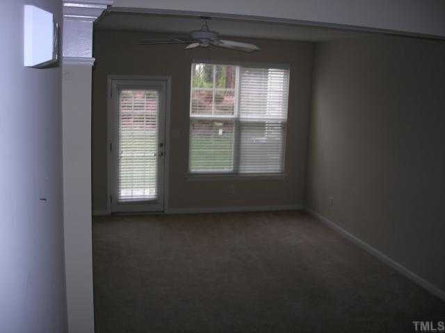 8453 Central Drive Raleigh, NC 27613 - Photo 6 of 8 a view of an empty room with a window