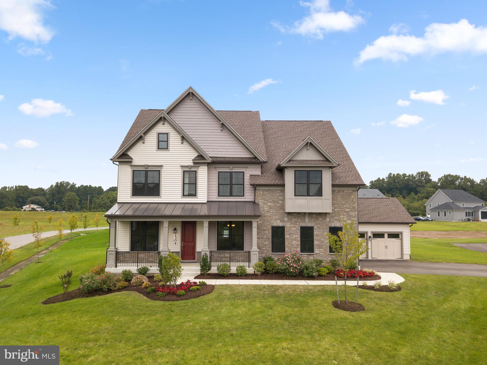 a front view of house with yard swimming pool and outdoor seating