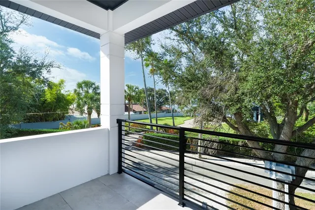 a bathroom with a double vanity sink and mirror