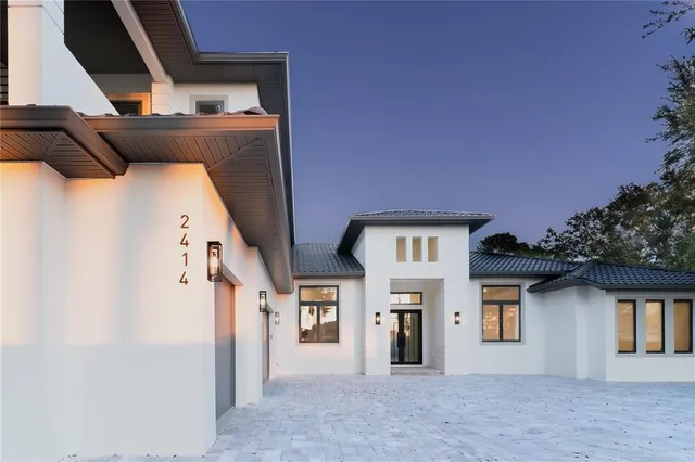 a front view of a house with garage