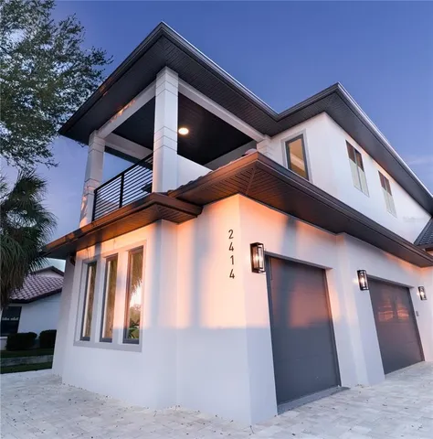 a view of a house with a garage
