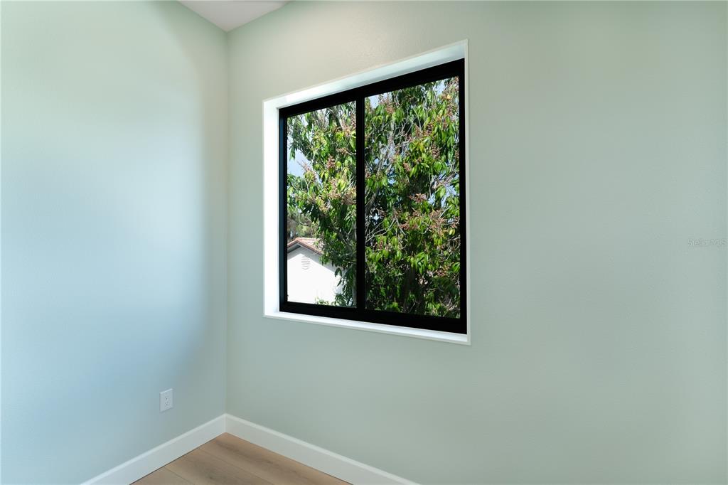 2414 Bayshore Road Nokomis, FL 34275 - Photo 55 of 64 a view of a small space with a window