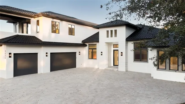 a view of a house with a garage