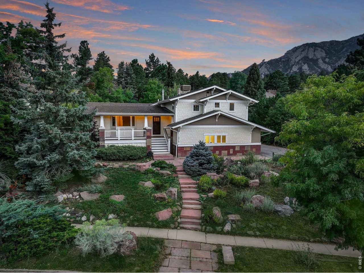 1875 Lehigh Street Boulder, CO 80305 - Photo 1 of 47 a view of a big house with a big yard and large trees