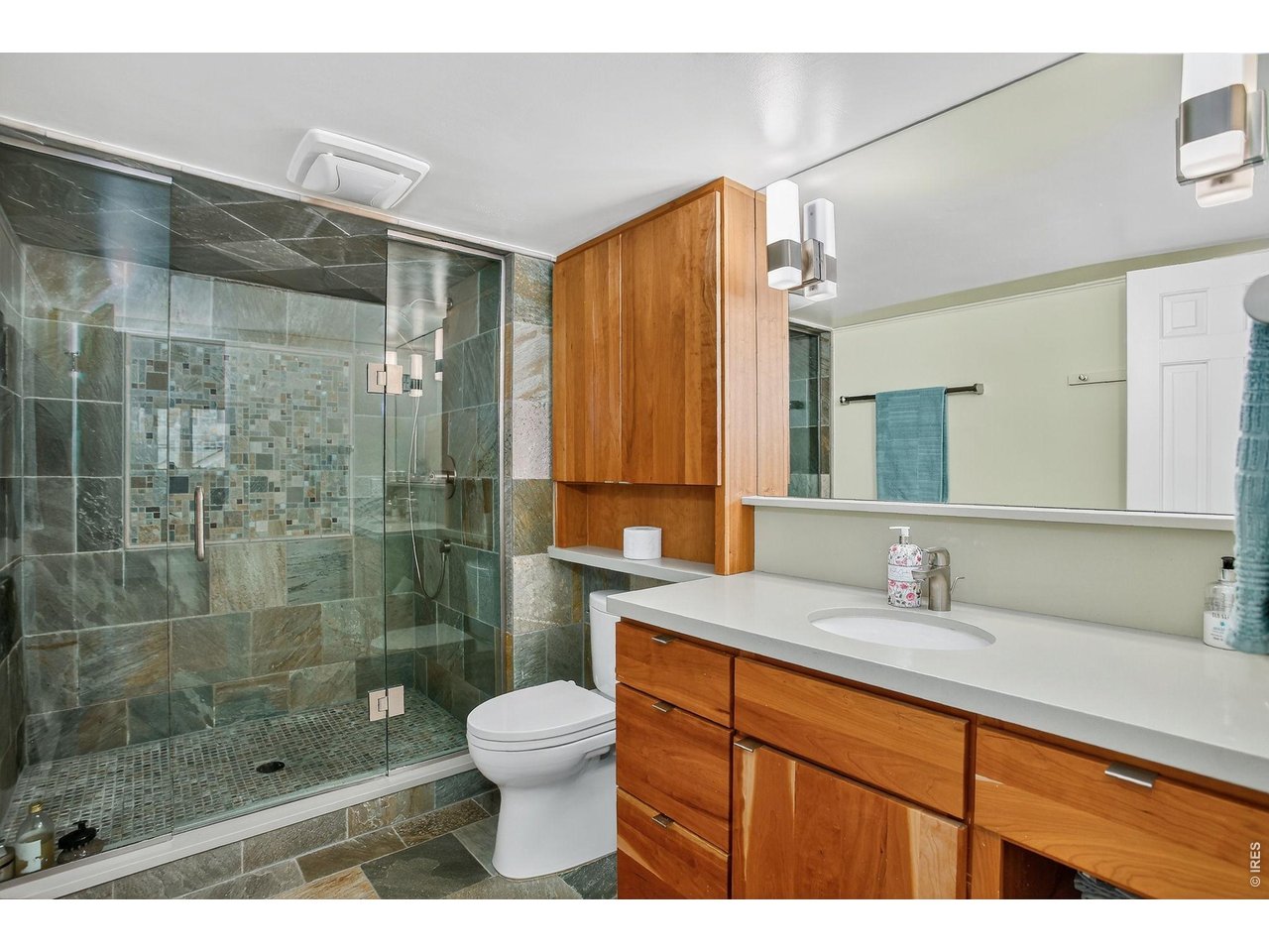 1875 Lehigh Street Boulder, CO 80305 - Photo 25 of 47 a bathroom with a sink and a mirror