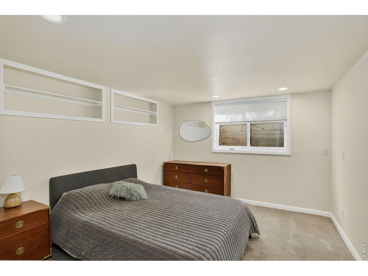 1875 Lehigh Street Boulder, CO 80305 - Photo 33 of 47 a bedroom with a bed and a dresser