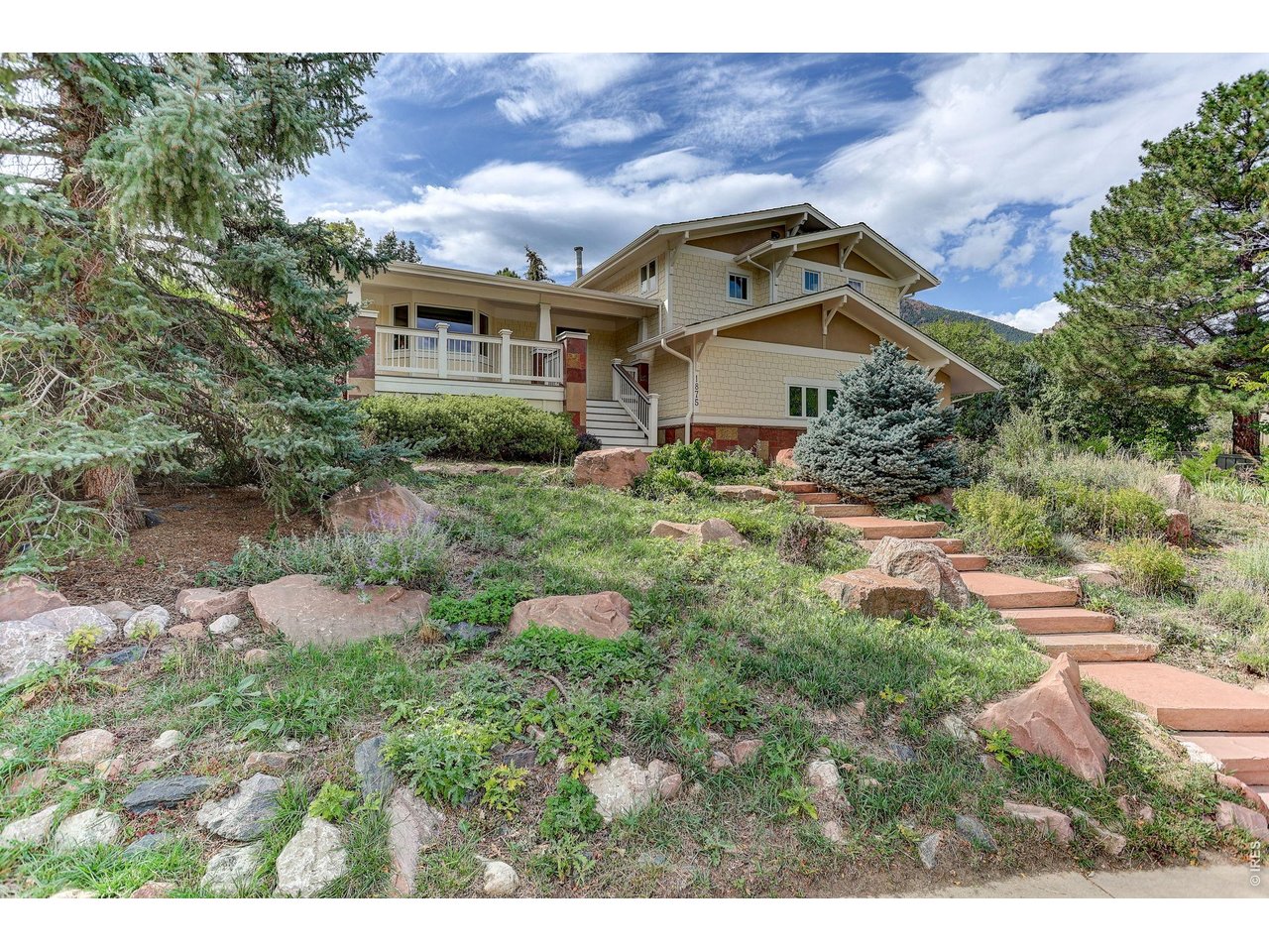 1875 Lehigh Street Boulder, CO 80305 - Photo 40 of 47 a front view of a house with a yard