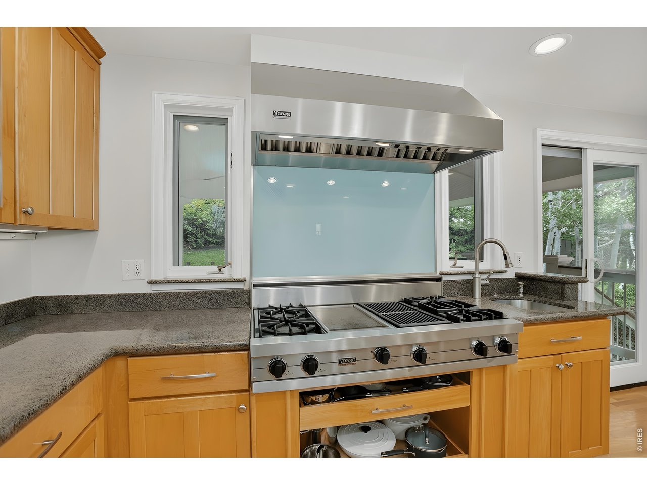1875 Lehigh Street Boulder, CO 80305 - Photo 7 of 47 a kitchen with granite countertop a stove and a sink