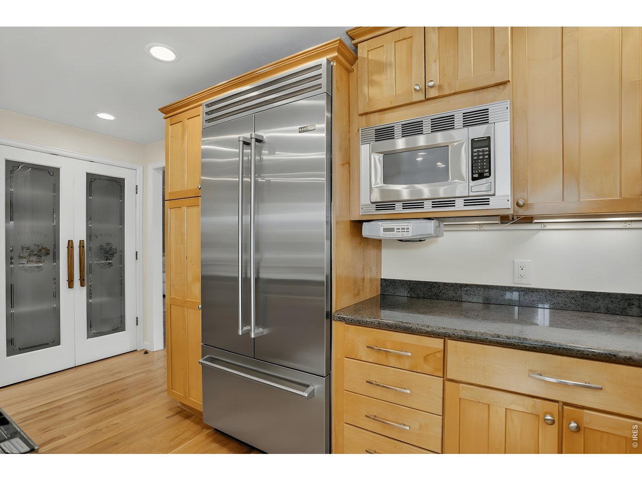 1875 Lehigh Street Boulder, CO 80305 - Photo 10 of 47 a kitchen with stainless steel appliances granite countertop a refrigerator and a sink